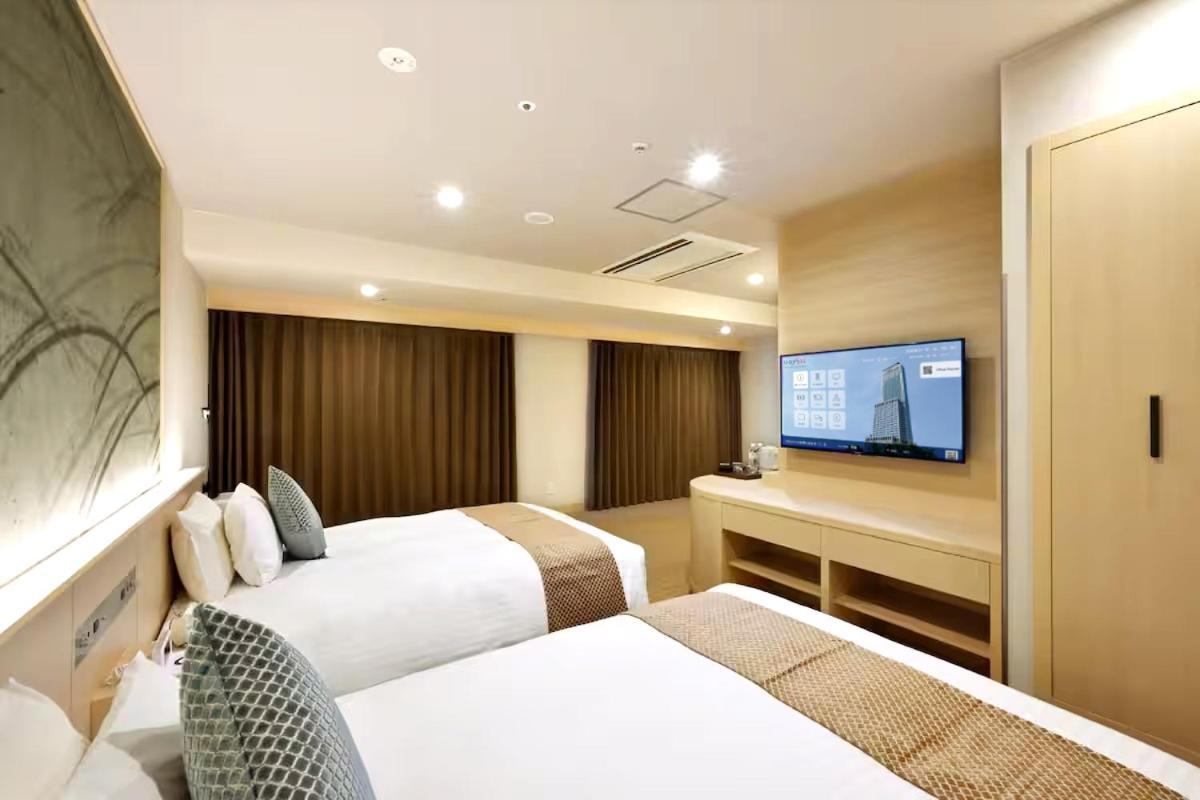 Odysis Suites Osaka Airport 酒店 4*