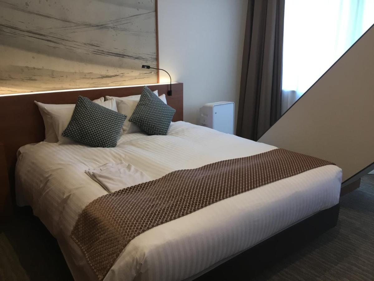 Odysis Suites Osaka Airport Hotel